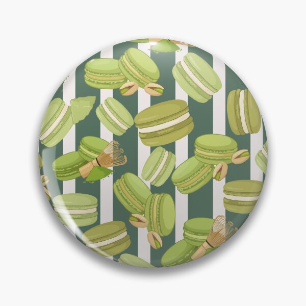 Item preview, Vector seamless pattern with green matcha and pistachio macarons for confectionery branding, bakery wrapping paper, and fabric print design designed and sold by Jemmiko.