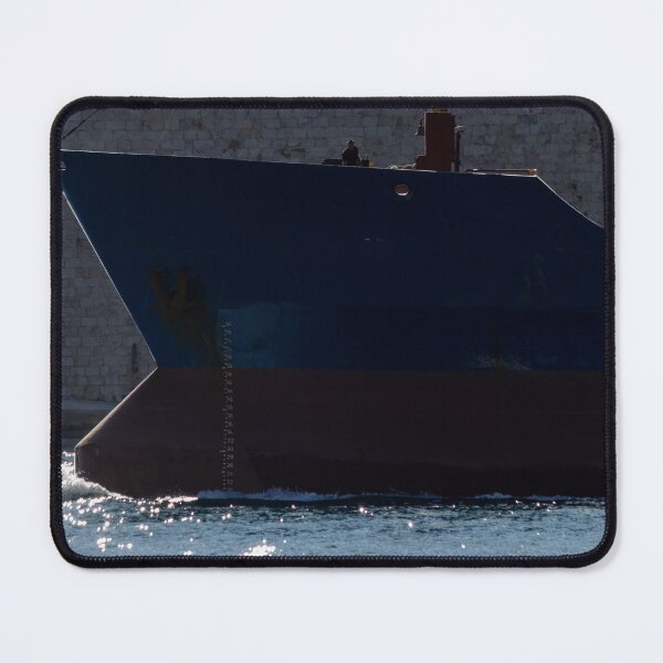 Item preview, Cargo Ship Bow Close-Up in Harbor Water Against Stone Wall With Reflections and Measurement Marks designed and sold by Nmallia.