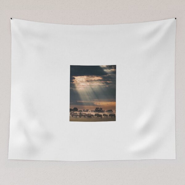 Item preview, Dramatic Light Over Wildebeest Herd at Dusk designed and sold by wildframe-color.
