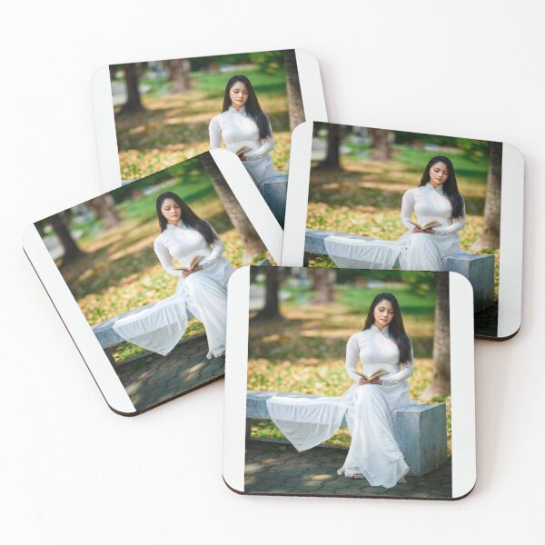 Item preview, Vietnamese Woman in White Ao Dai Reading Book designed and sold by artisfun333.