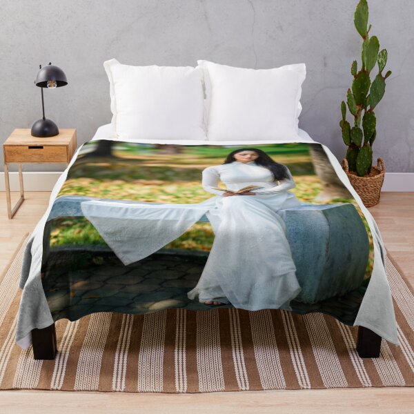 Item preview, Vietnamese Woman in White Ao Dai Reading Book designed and sold by artisfun333.