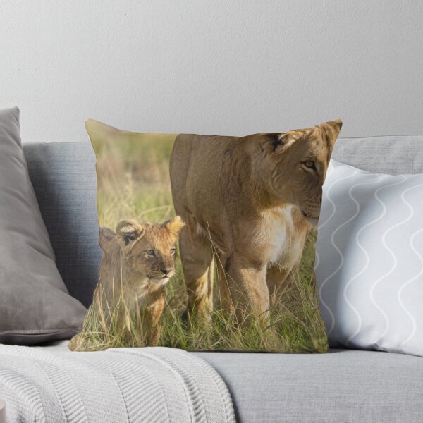 Item preview, Lioness and Curious Lion Cub Exploring the African Savanna – Wildlife Photography designed and sold by LazyOwlStore.
