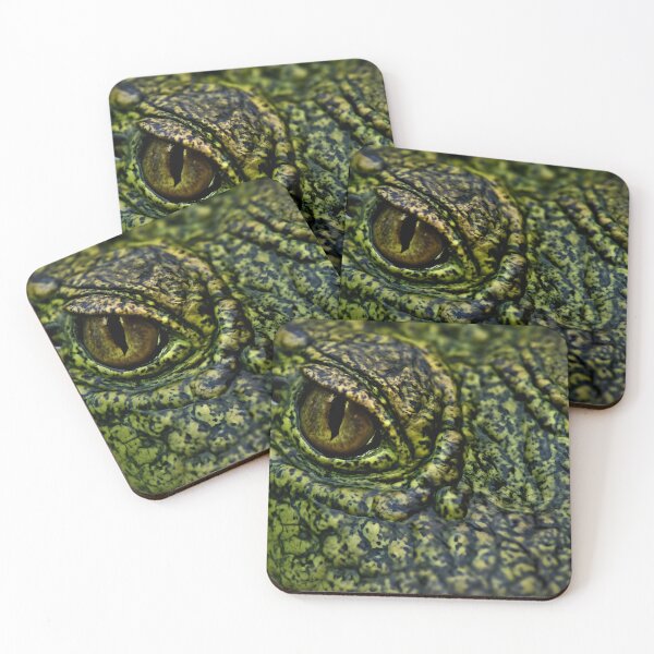Item preview, A close up macro view of a crocodile's eye and textured scales designed and sold by homydesign.
