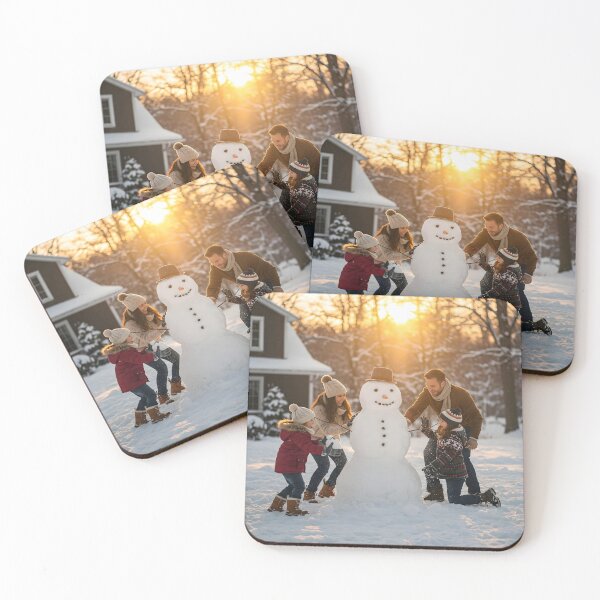 Item preview, Family of four building a snowman in a snowy yard at sunset, with a house in the background designed and sold by homydesign.