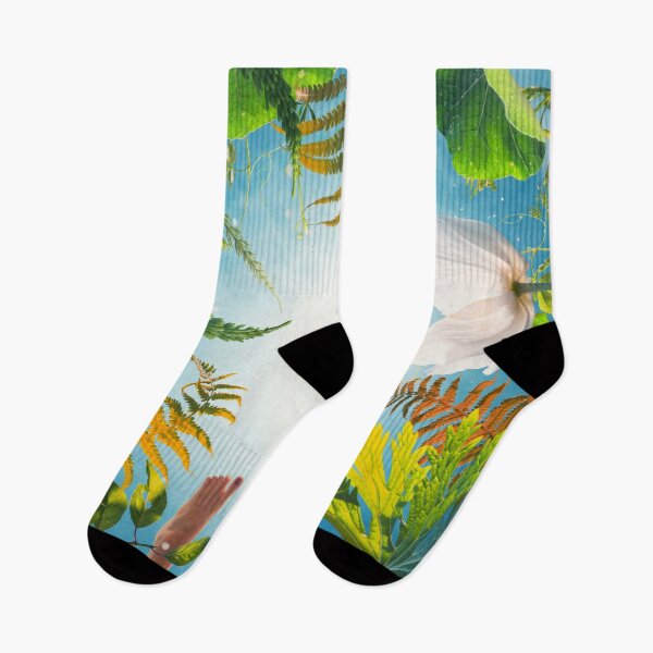 Item preview, Feet with a dandelion between the toes, part of a floral composition against the sky; low-angle shot. designed and sold by Vizerskaya.