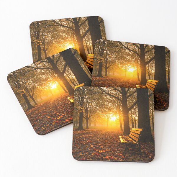 Item preview, A solitary wooden bench sits in a golden autumn park filled with fallen leaves and glowing sunlight.    designed and sold by homydesign.