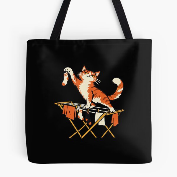 Item preview, Ginger Cat Stealing a Sock From Laundry designed and sold by Zyvora-merch.