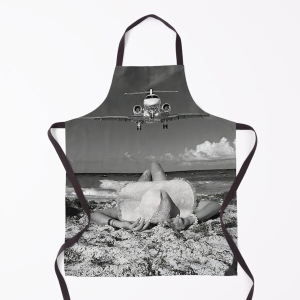 Item preview, Steady As She Goes; island style aircraft coming in for a landing over woman lying on the beach black and white photography photographs photograph poster art designed and sold by Astrid Arkhangelsky.