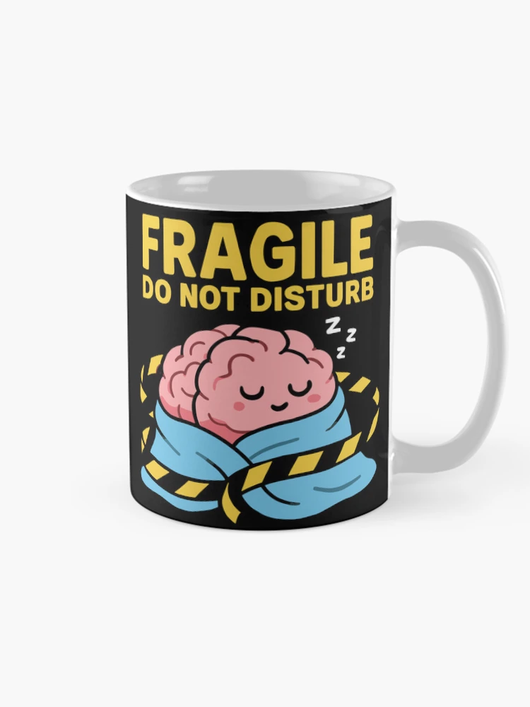 Fragile Do Not Disturb Sleeping Brain In Blanket Caution Tape on a Mug