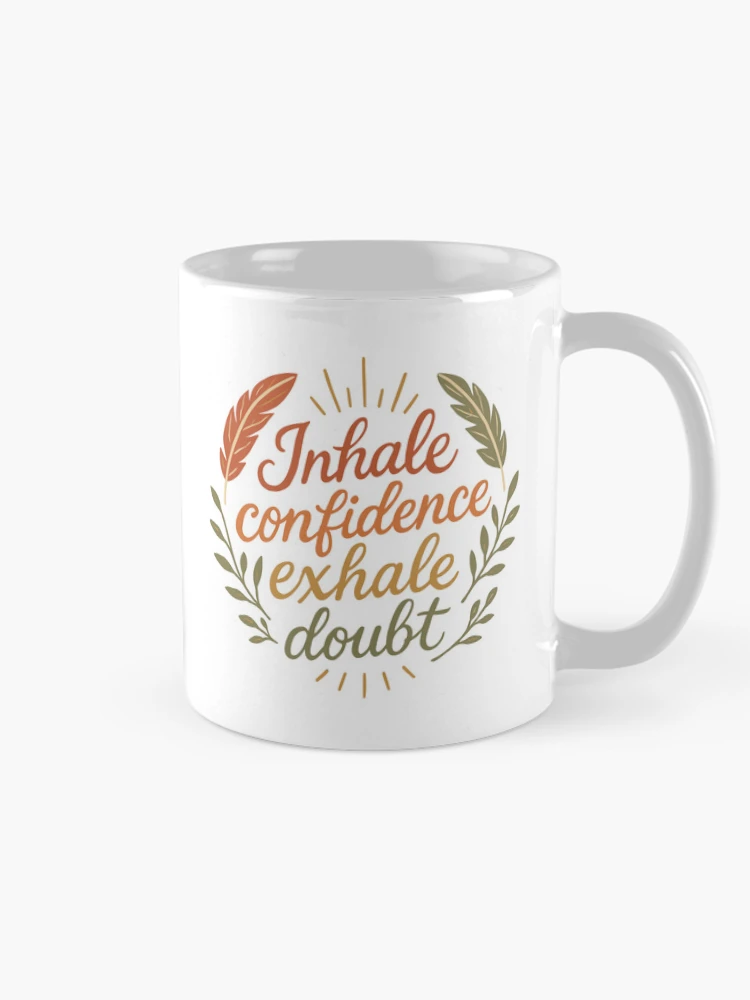 Inhale Confidence Exhale Doubt Script Feathers Leaf Wreath on a Mug