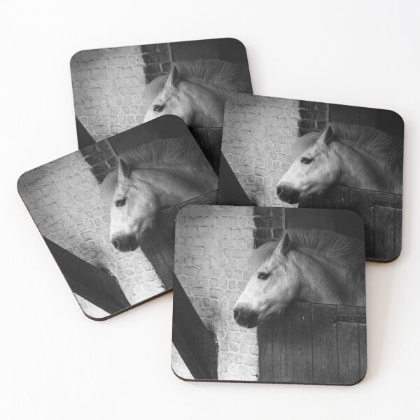 Item preview, White Horse Resting In Rustic Stable Stall With Wooden Door And Brick Wall Background on black and white designed and sold by FotoMahieu.