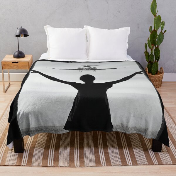 Item preview, Life in Silhouette - brand new day at sunrise with low flying plane flying toward young woman black and white fine art photography by Astrid Arkhangelsky designed and sold by Astrid Arkhangelsky.