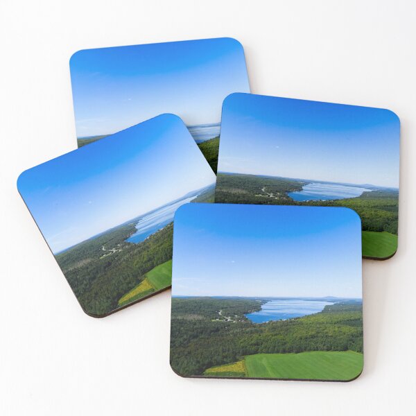 Item preview, Aerial Panoramic View of Blue Lake Surrounded by Forested Hills and Green Farmland designed and sold by celinebisson.