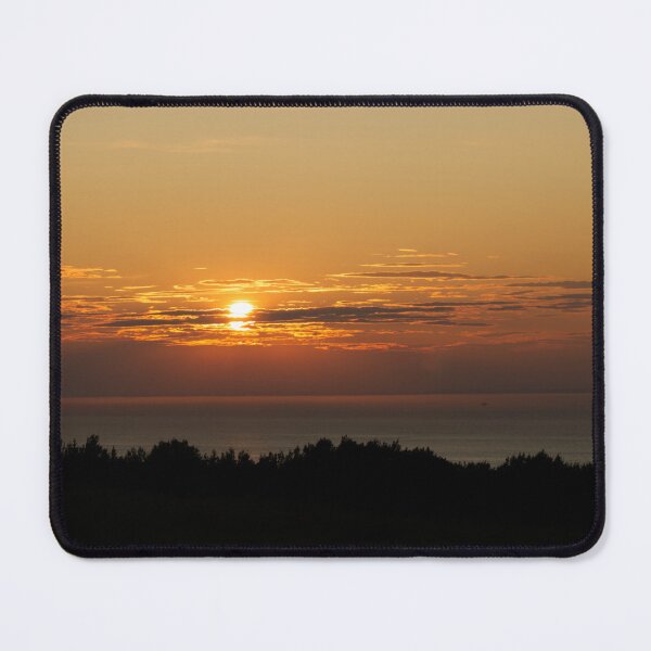 Item preview, Golden Sunset Over Calm Water with Dark Forest Silhouette designed and sold by celinebisson.
