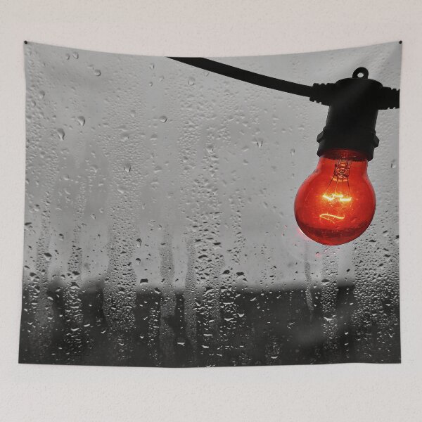 Item preview, Glowing Red Edison Light Bulb in front of a Rain Streaked Window designed and sold by ConcreteCandy.