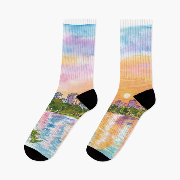 Item preview, Reflejos del lago Eola bajo el horizonte del centro de Orlando. designed and sold by artshop77.