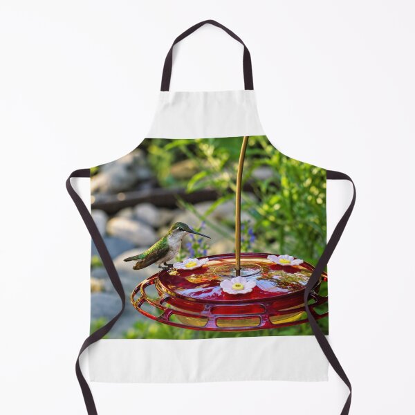 Item preview, Hummingbird Resting on a Red Feeder designed and sold by Astute-Artio-Photography.