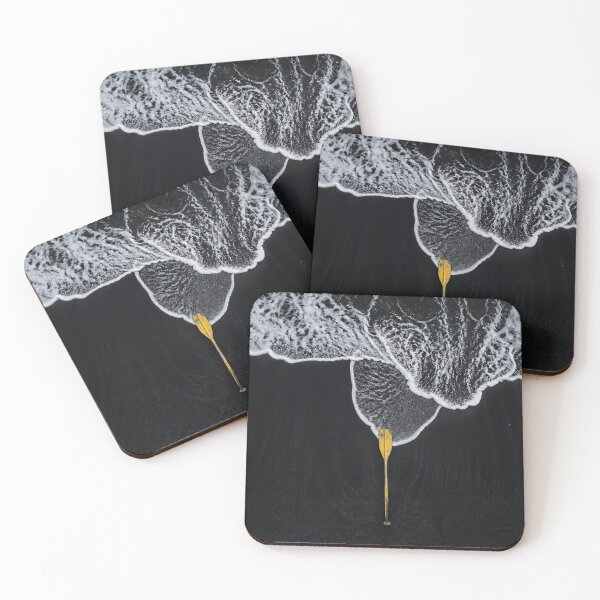 Item preview, White foam over black sand beach with Yellow oar designed and sold by ConcreteCandy.