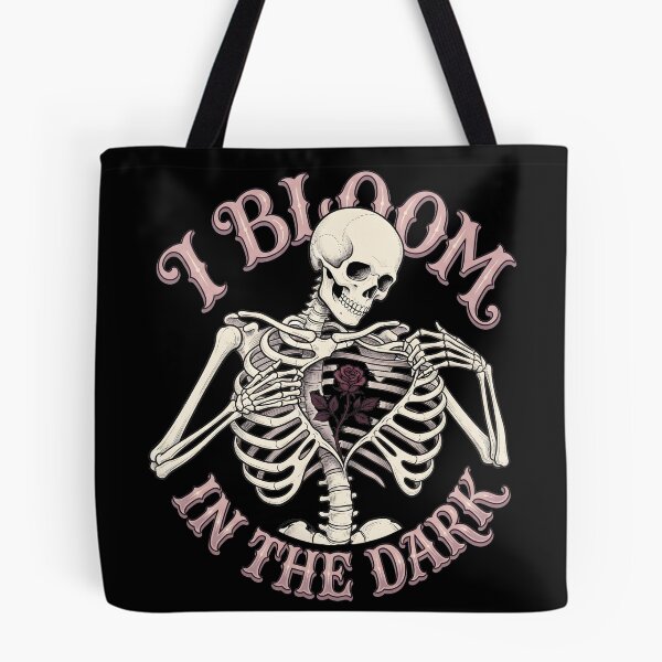Item preview, Skeleton Cradles a Rose Inside Its Ribcage Beneath Pink Lettering designed and sold by MisteryDesigner.