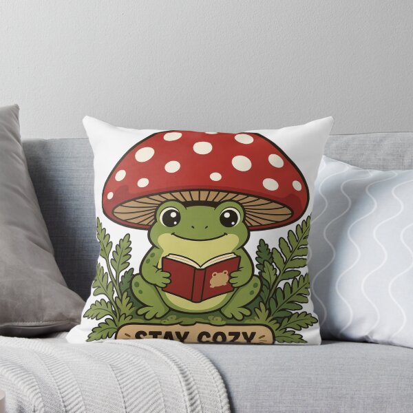 Item preview, Stay Cozy Cottagecore Frog Under Mushroom Reading Book designed and sold by TitanForged.