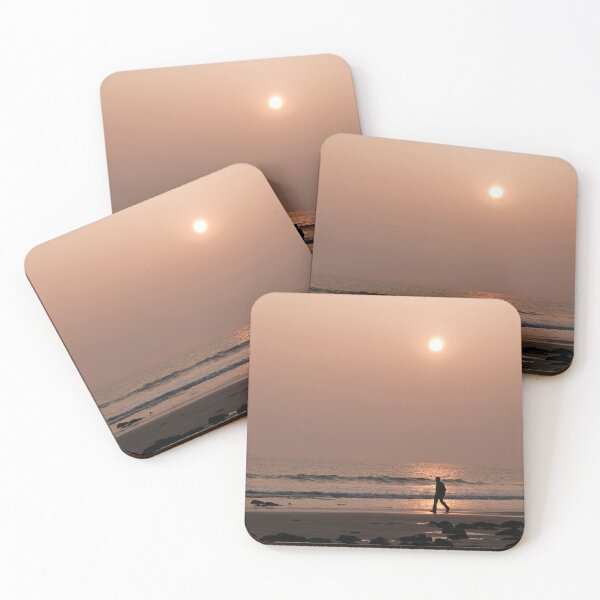 Item preview, Lone Walker walking across the path of the Setting Sun one evening on Llantwit Major beach on the Glamorgan Heritage Coast, south Wales.  designed and sold by Cameranick.