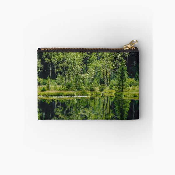 Item preview, Symmetry of trees reflection in calm water of forest lake, freshness of nature designed and sold by Alexander Sorokopud.