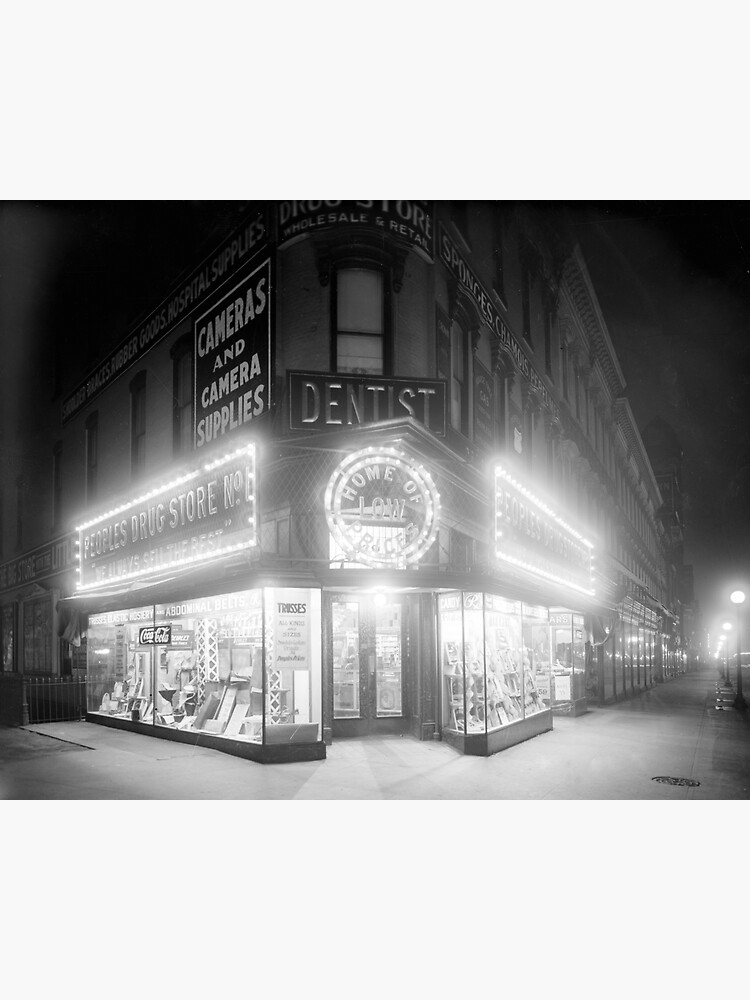 "Corner Store At Night, 1920. Vintage Photo" Sticker for Sale by