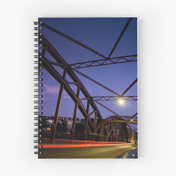 Item preview, Perspective of an iron bridge with car light trails at twilight in Berlin, Germany designed and sold by Reinvention.