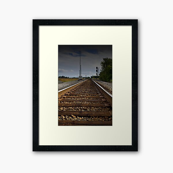 Along the tracks Framed Art Print