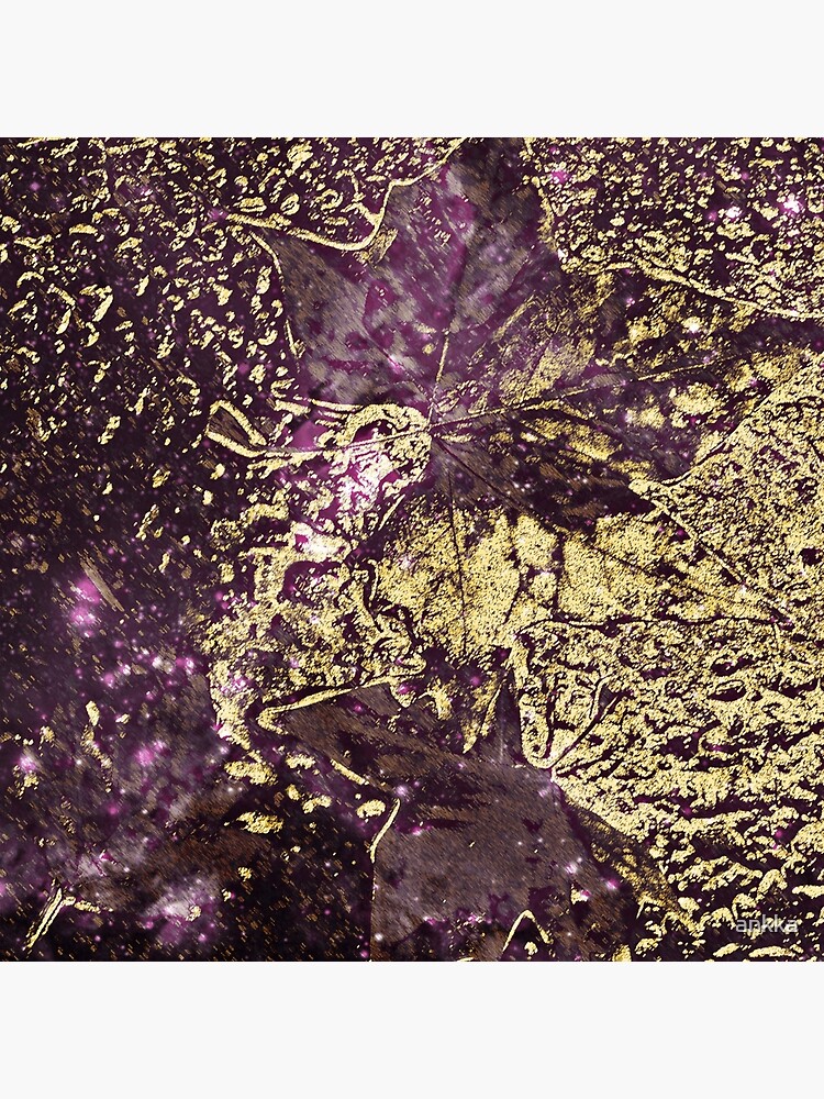 Two purple leaves in melted gold by ankka