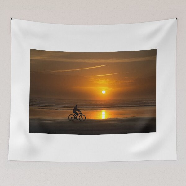 Item preview, Silhouette of a cyclist along Cannon Beach Oregon designed and sold by Martin Lawrence.
