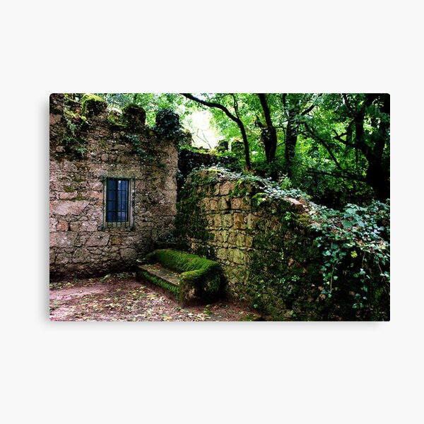 A bench in the shadow of the Moorish Castle Canvas Print