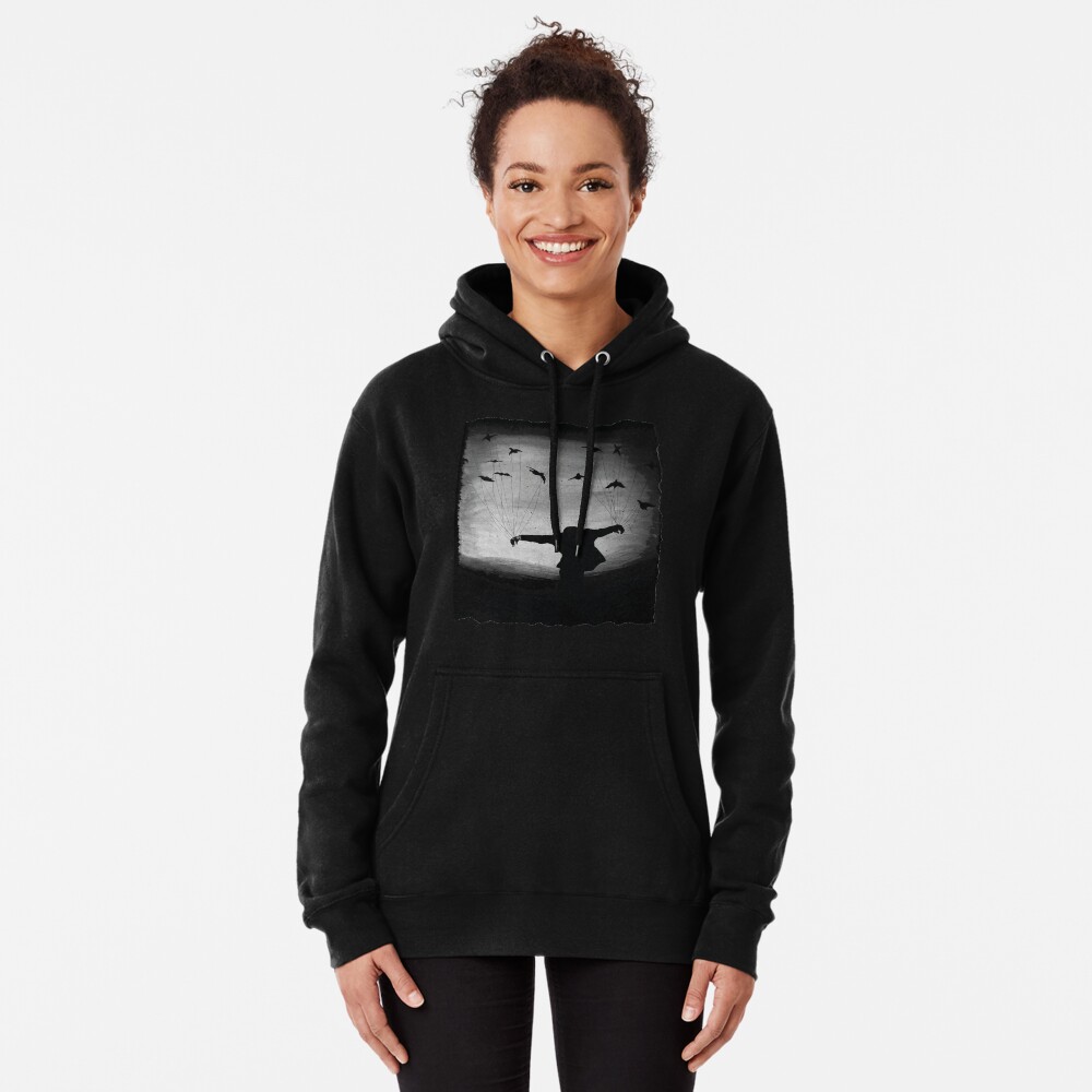 Man In flight with ravens Pullover Hoodie