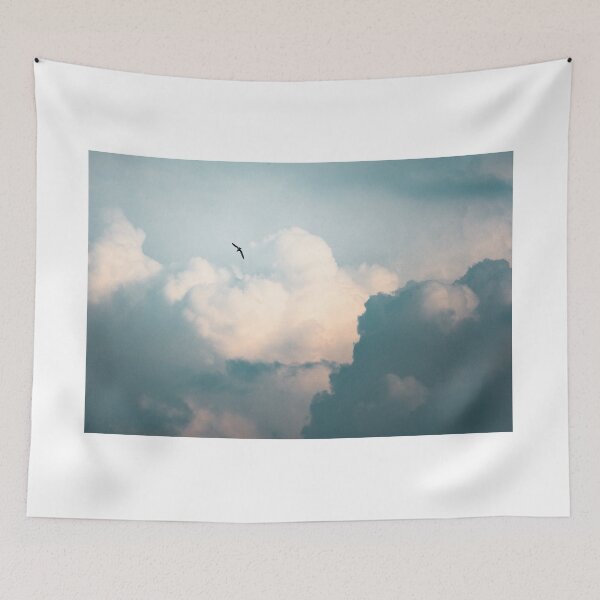 Item preview, Seagull flies in a background with foamy clouds designed and sold by Fa scri.