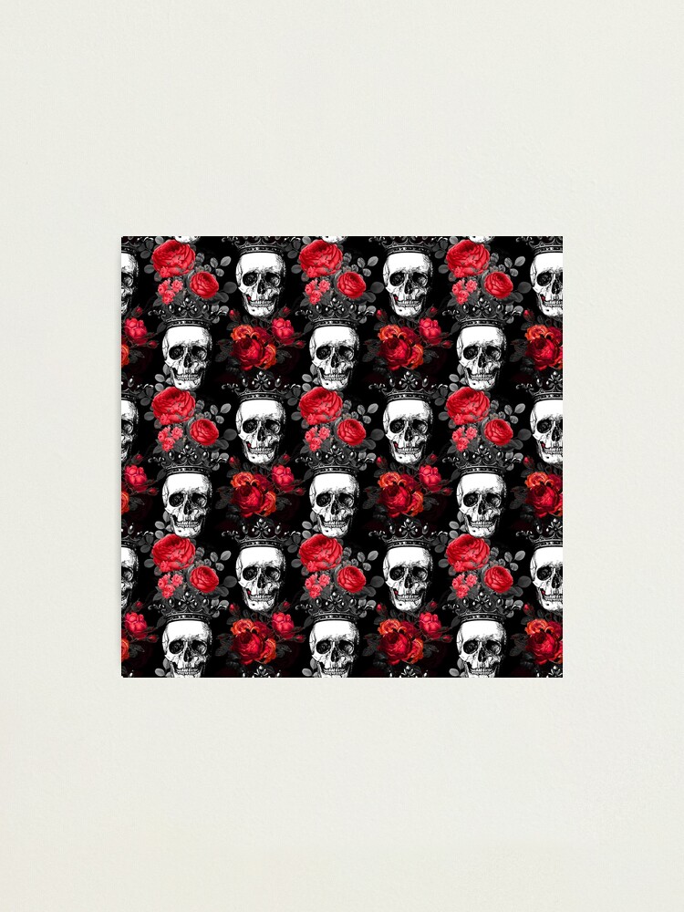 Skulls crowns and faded red roses on a dark black wrapping paper