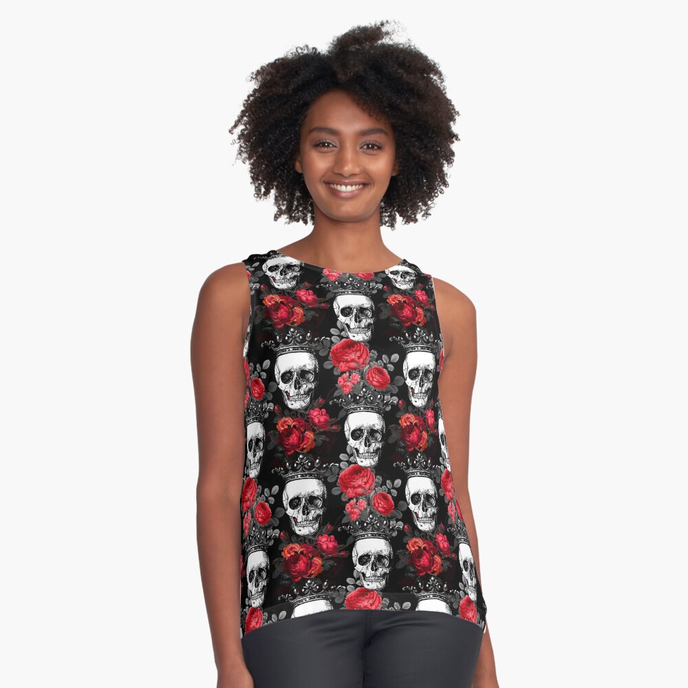 Skulls crowns and faded red roses on a dark black wrapping paper