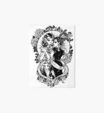 Asian lady of vintage beauty hugs a girl in a dance. Art Board