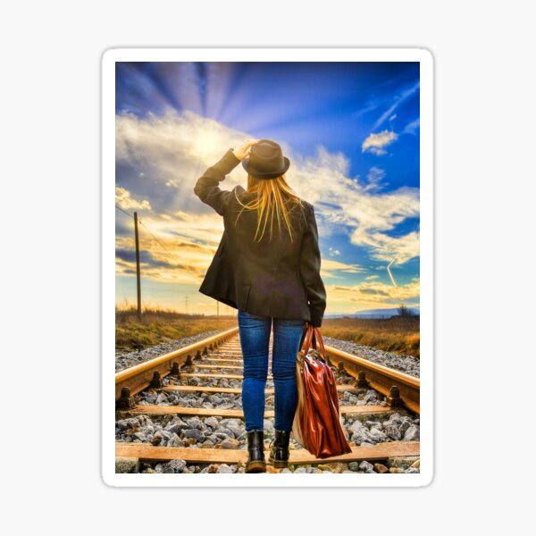 A girl traveling on the tracks Sticker