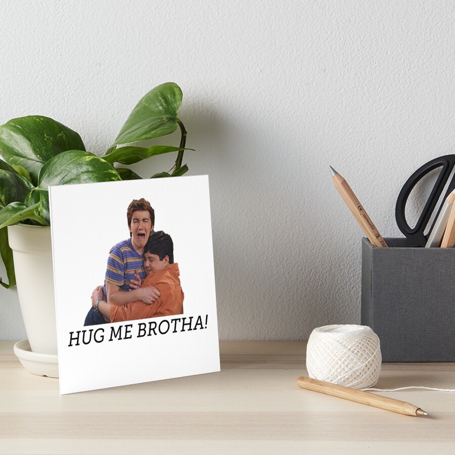 Art board print featuring stylized artwork of Drake and Josh with the text 'HUG ME BROTHA! Drake and Josh'.