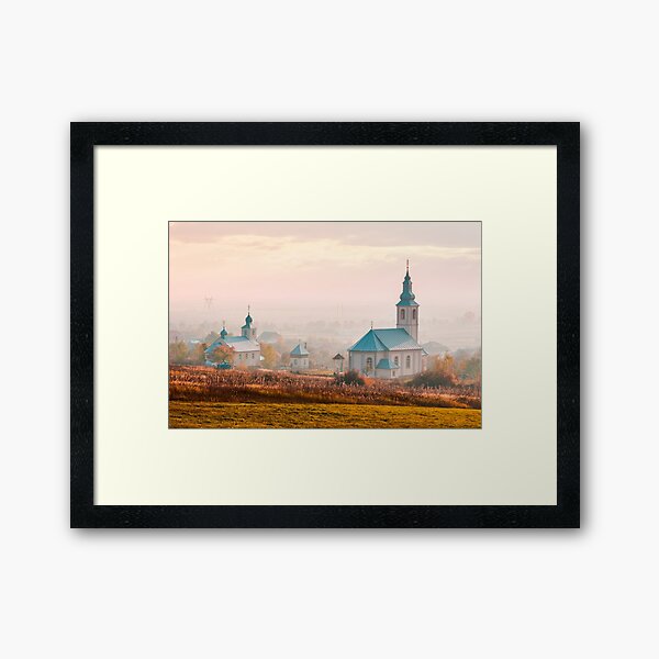 catholic and orthodox churches at foggy sunrise Framed Art Print