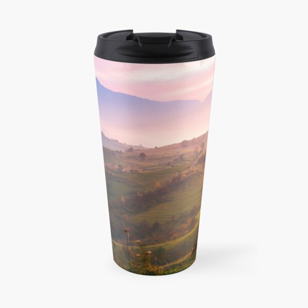 purple sunrise in foggy countryside Travel Mug