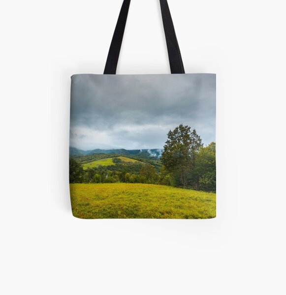 grassy rural meadow in mountains All Over Print Tote Bag