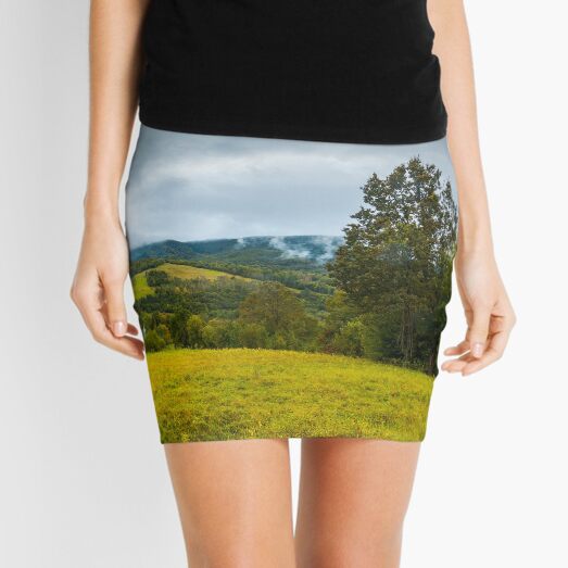 grassy rural meadow in mountains Mini Skirt