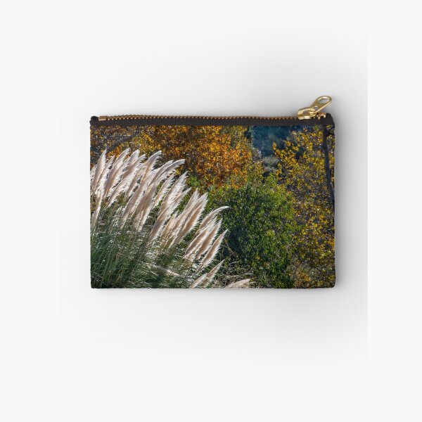 Item preview, White feather pampas grass on the background of trees with autumn foliage. designed and sold by EG Creativity Art.