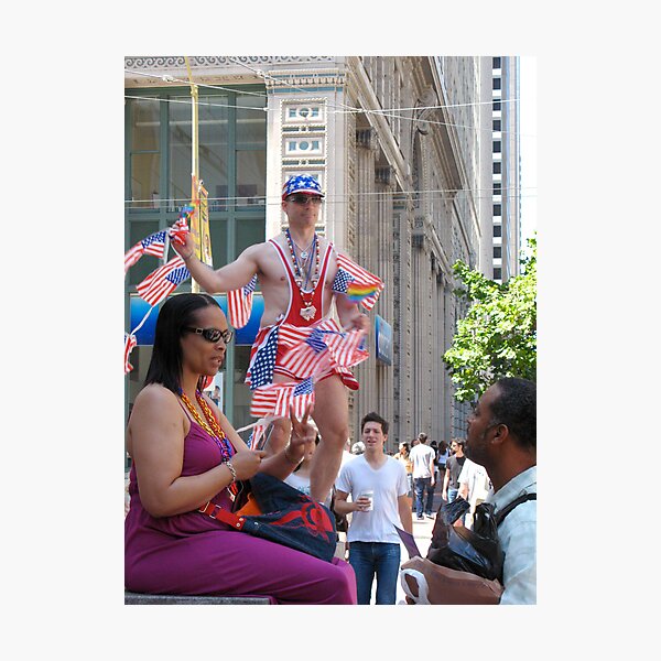 A gay man with American flags Photographic Print