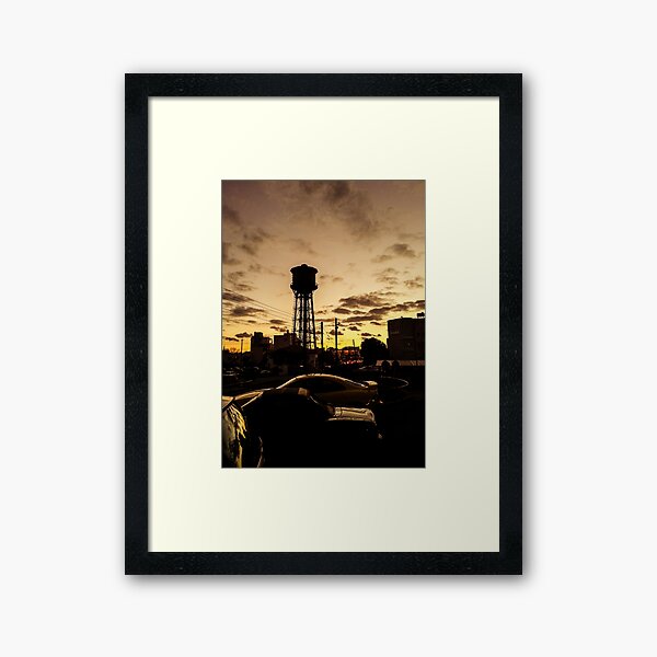 Water tower sunset Framed Art Print