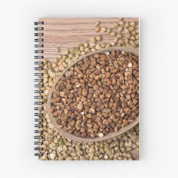 Item preview, Natural fresh buckwheat in wooden spoon. On a wooden table. designed and sold by vkph.