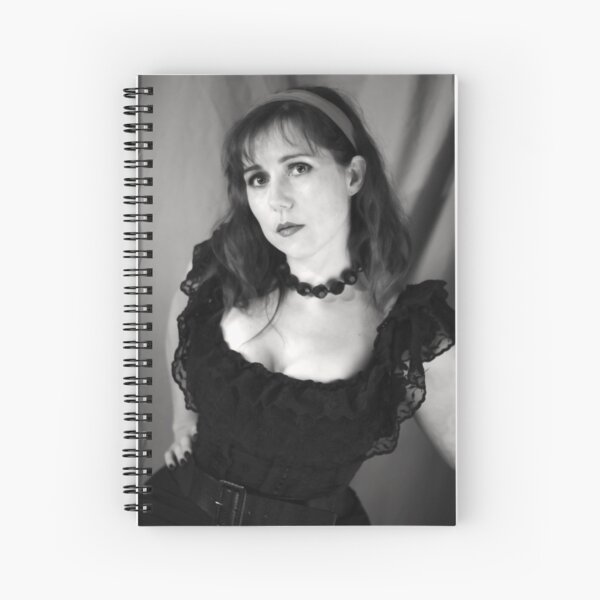 The curve is mightier than the sword! Spiral Notebook