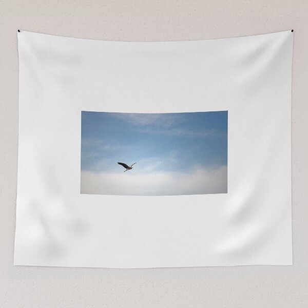 Item preview, heron flying on blue sky designed and sold by goceris.