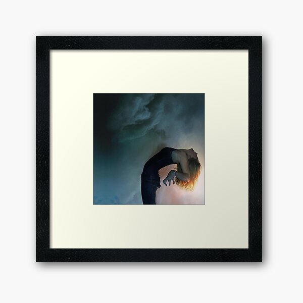 the storm against the light Framed Art Print